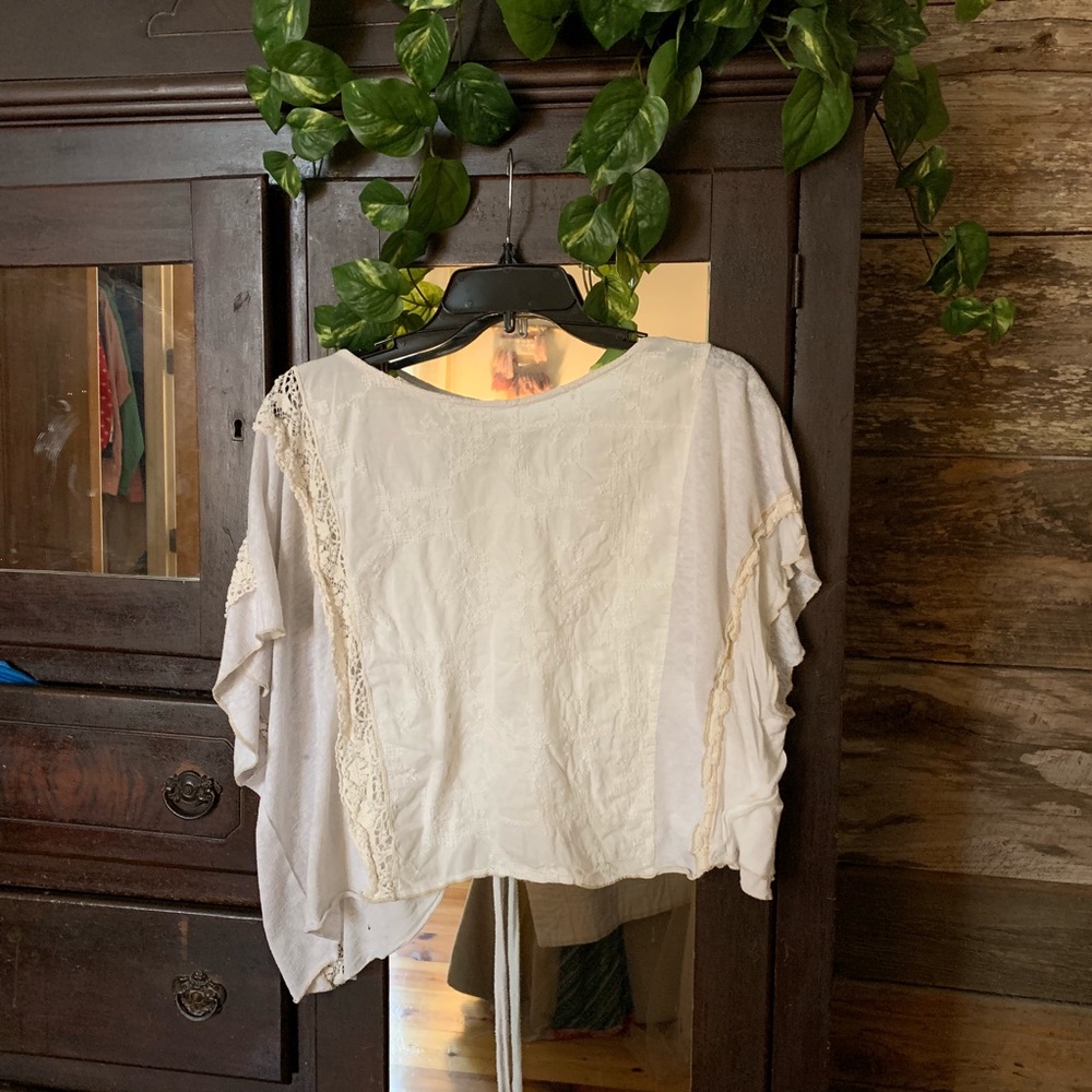 Tiny asymmetrical cropped shirt